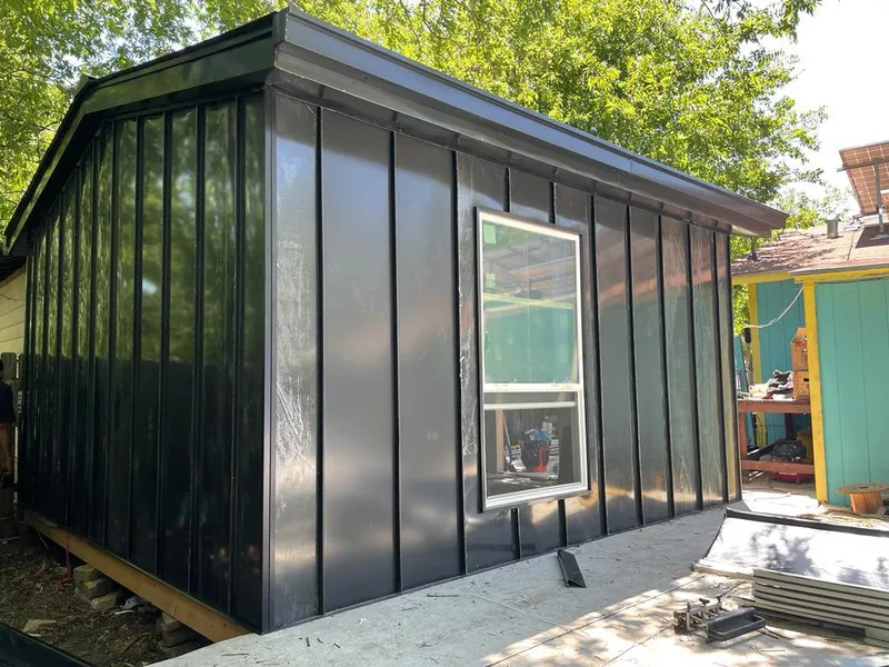 Black standing seam metal wall panels for Metal Roof Installation in Ward