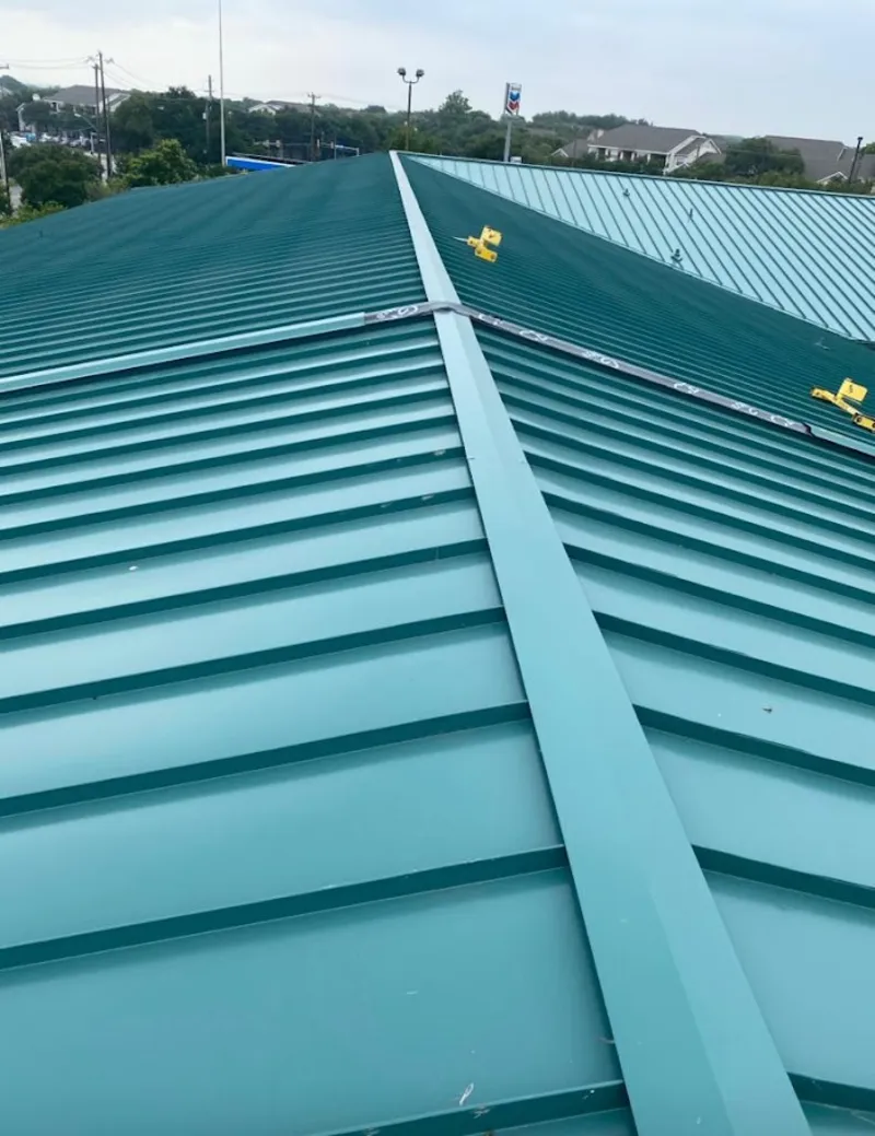 Green commercial metal roof ridge and valley for Metal Roof Repair in Ward